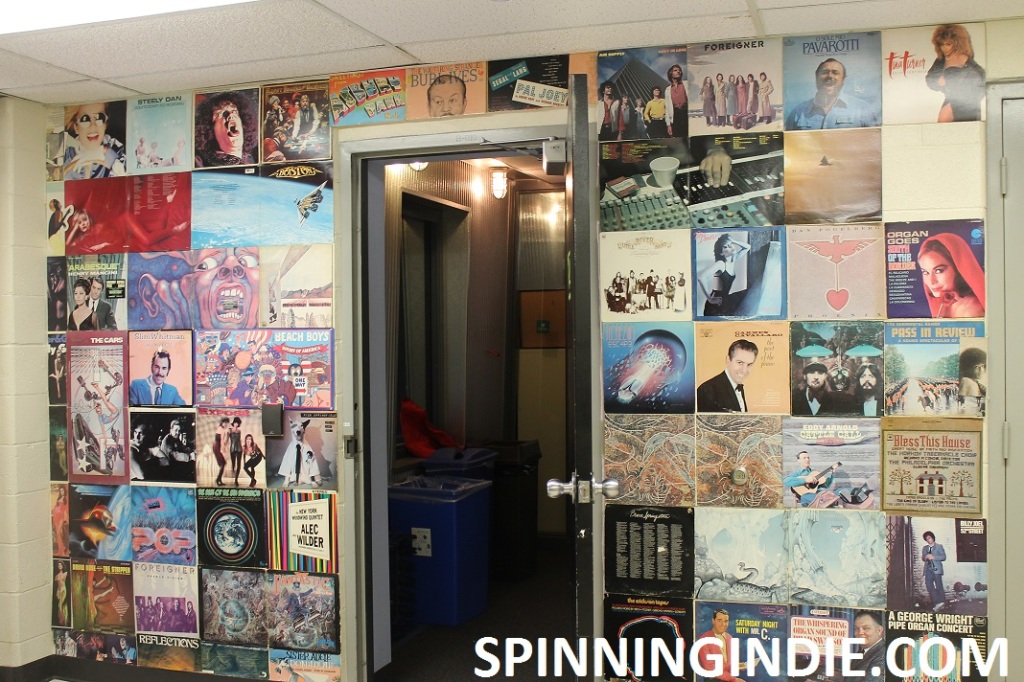 Album covers surrounding entrance to college radio station WLOY