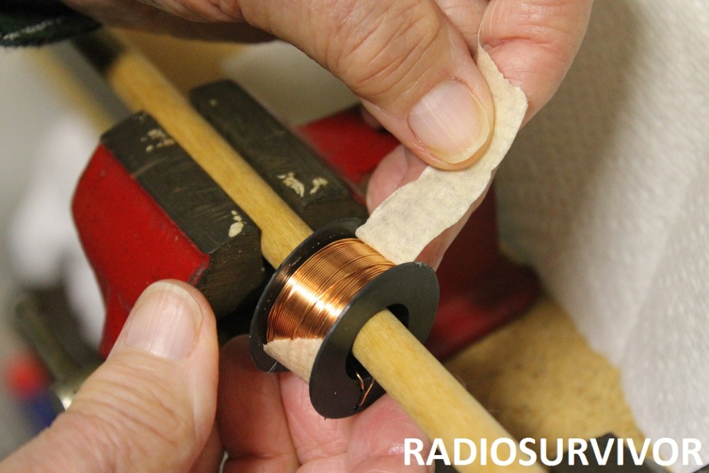 spool of copper on a dowel