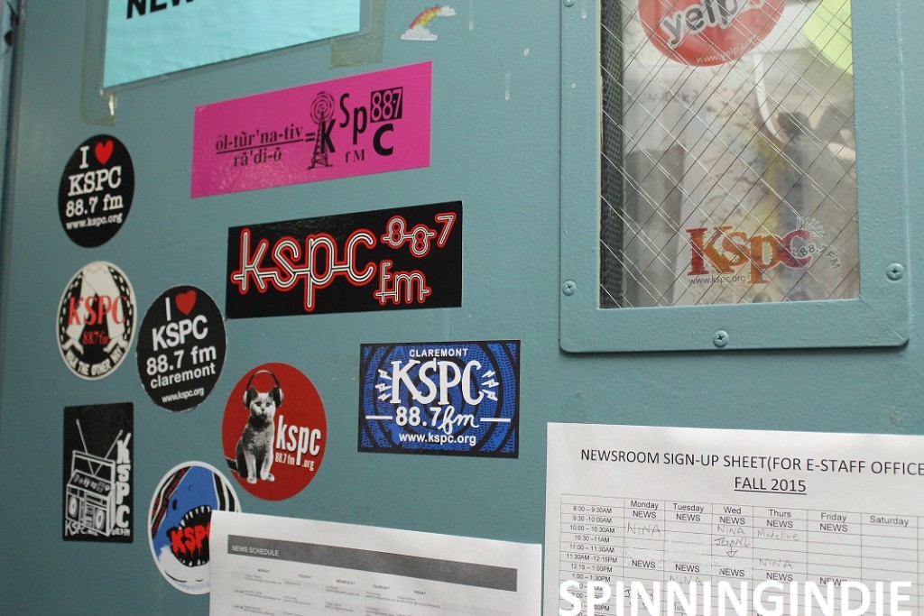 KSPC stickers on News Room door. Photo: J. Waits