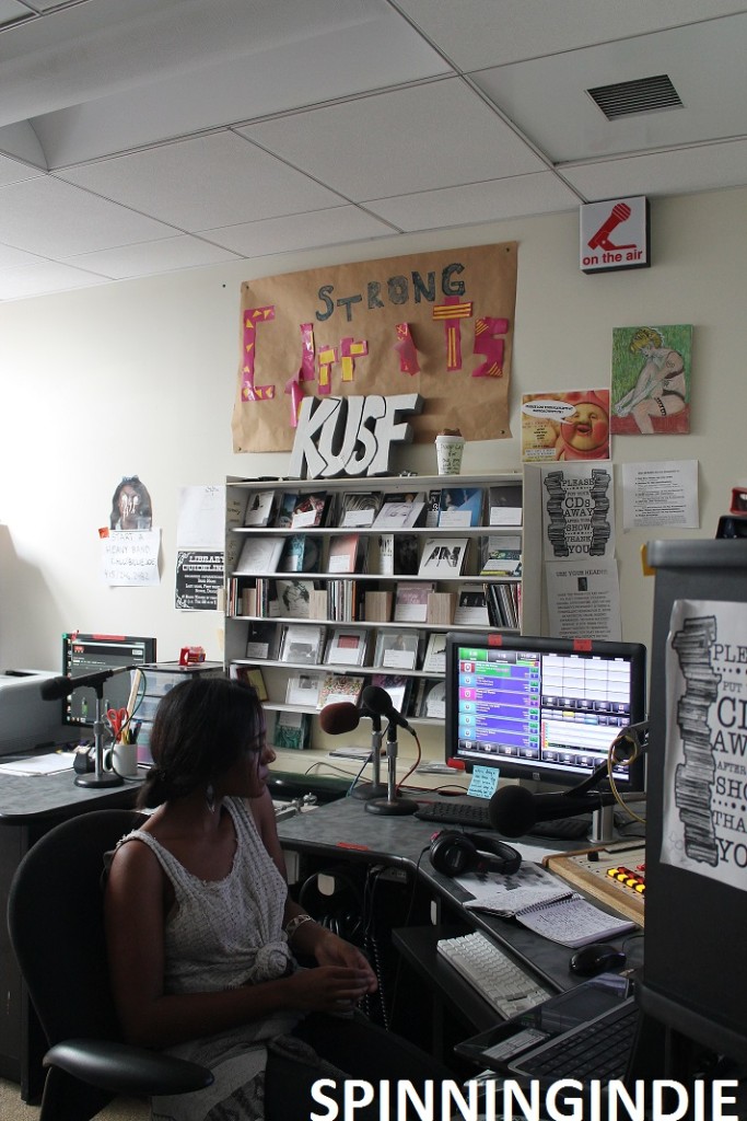 Student DJ in studio at college radio station KUSF.org. Photo: J. Waits