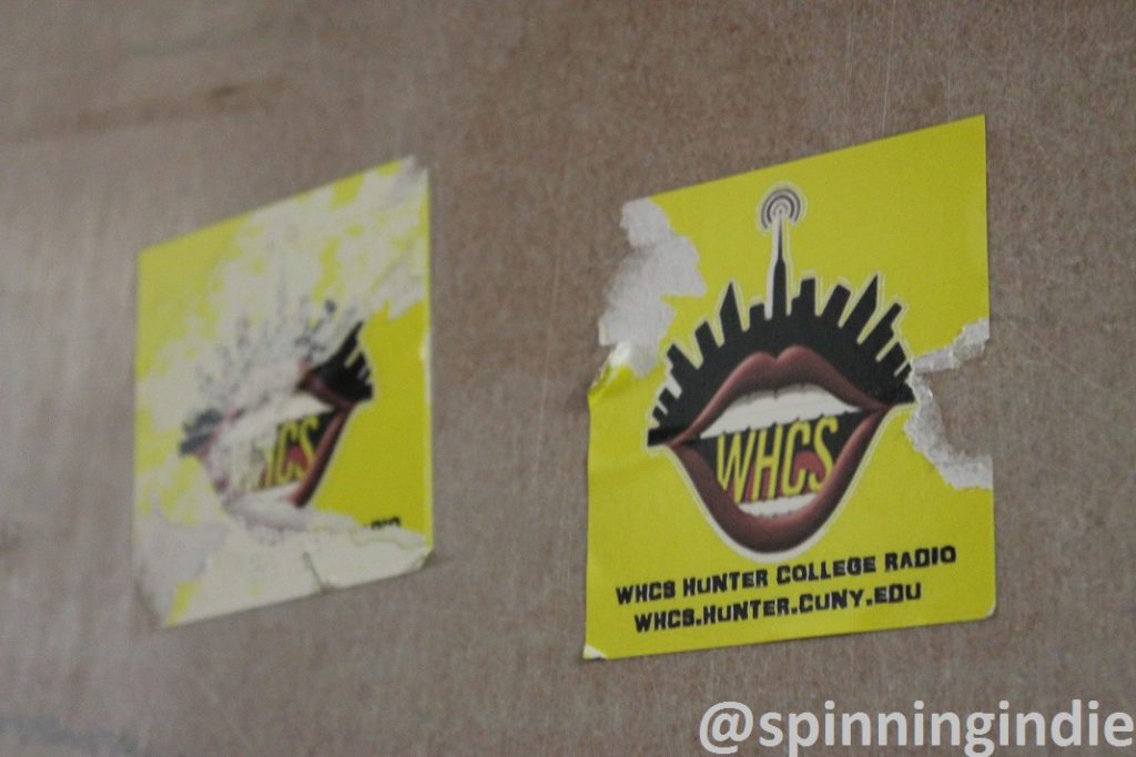 Old WHCS stickers on wall across from station's former home. Photo: J. Waits