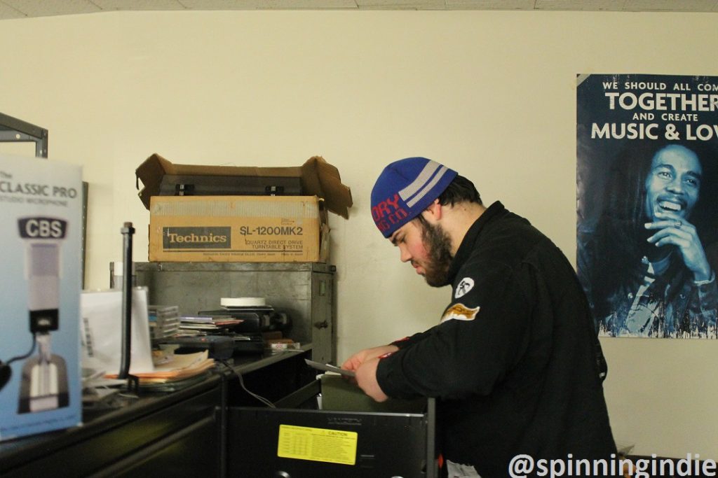 Joe D'Antonio looks through WCUA files. Photo: J. Waits