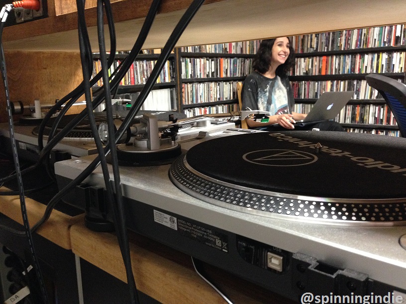 A glimpse through the turntables in the KUCI on-air studio. Photo: J. Waits