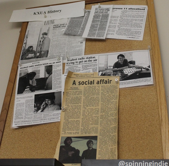 History wall at college radio station KXUA. Photo: J. Waits