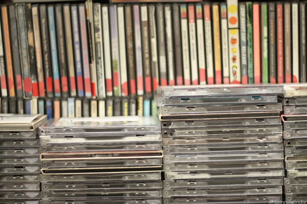 Photo of packed shelf of CDs at college radio station KCR. Photo: J. Waits/Radio Survivor