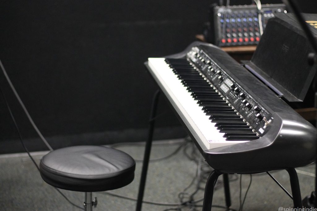 KSDT Practice Room. Pictured: keybaord, stool, and audio equipment in background. Photo: J. Waits/Radio Survivor