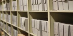 Foothill College archives. Photo by J. Waits Photo of shelves containing archival boxes. Photo by J. Waits