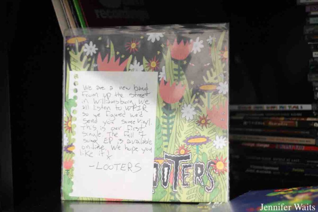 Promotional record at WPIR Pratt Radio. Handwritten note reads: "We are a new band from up the street in Williamsburg. We all listen to WPIR so we figured we'd send you some vinyl. This is our first single...Looters." Photo: J. Waits