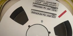 Photo of open reel tape with The Famous Computer Cafe written on it