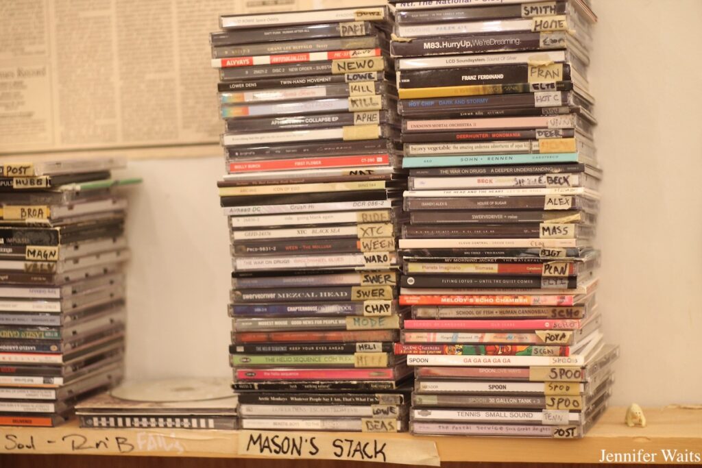 Stack of CDs in the studio at Bowdoin College radio station WBOR. Under the stack is a note: "Mason's stack." Photo: J. Waits