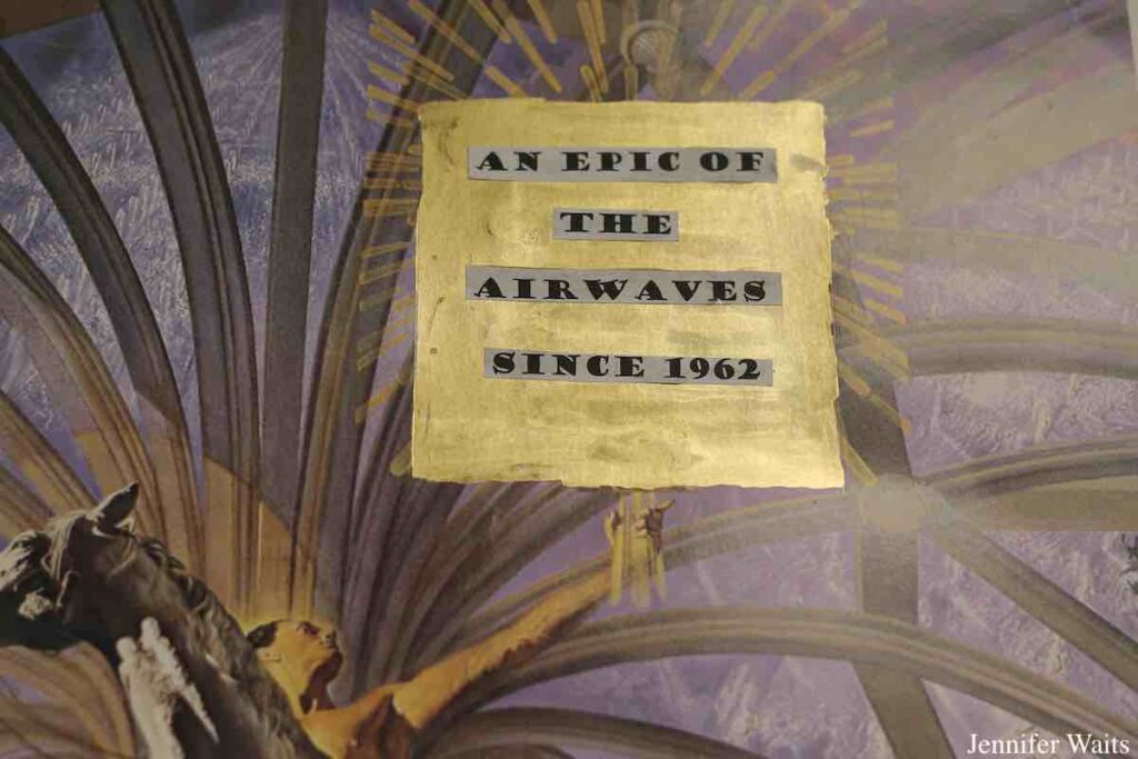 Photo of poster/artwork at WONY-FM that has gold square in the center with the words "an epic of the airwaves since 1962" at the center. Photo: J. Waits