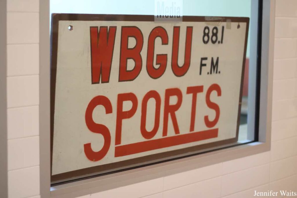 Photo of sign propped in window that reads "WBGU 88.1 FM Sports." Photo: J. Waits