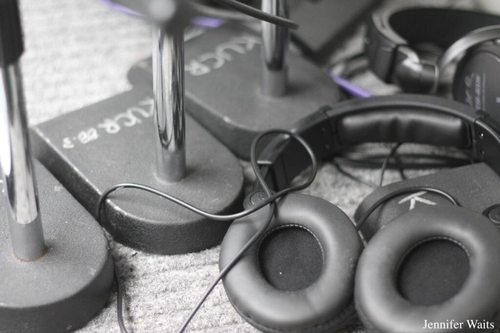 Photograph of headphones and other audio equipment at college radio station KUCR. Photo: J. Waits